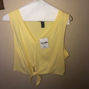 Yellow crop top with a knot